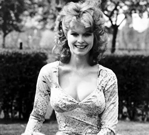 Square Prints: Actress Linda Lou Allen wearing a low cut top showing cleavage near her home in London