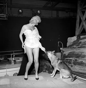 Actress Liz Fraser seen here having a little trouble with one of her co-stars on set