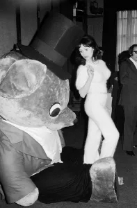 Actress and former model Madeline Smith picture with a giant teddy bear at a Variety Club