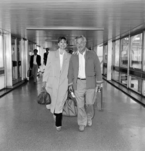 Actress Nanette Newman and her husband Bryan Forbes at Heathrow Airport. 3rd May 1987