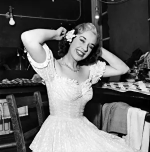 00042 Prints: Actress Ruth Dawes seen here in her, dressing room getting ready for the next performance