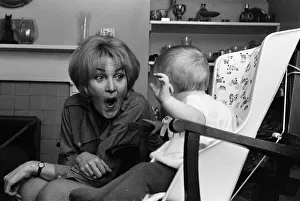 00986 Prints: Actress Sheila Hancock with her baby daughter Melanie Jane. 14th March 1965