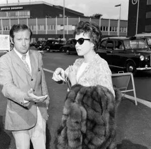 Fur Coat Prints: Actress Shirley MacLaine arrives at Heathrow Airport to fly to Nice. 13th May 1967