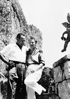 Blouse Prints: Actress and singer Gracie Fields standing on a rock with her husband Boris Alperouici