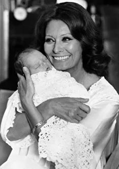 Woman And Child Prints: Actress Sophia Loren with baby Anita Cookson in August 1980