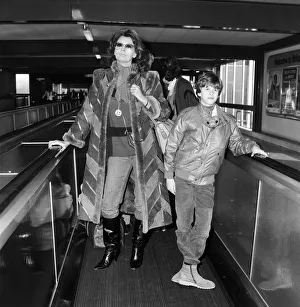 Actress Sophia Loren leaving London Airport for Los Angeles with her son Eduardo