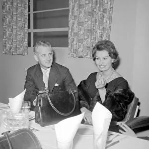 Actress Sophie Loren seen here standing before the presentation of a life size cake of