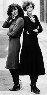 Actresses Sylvia Kristel (R) and Joan Collins 1981 stars of the film Two Way