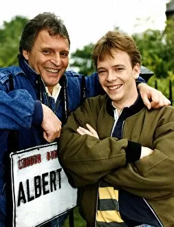 Images Dated 6th June 1991: Adam Woodyatt who stars in Eastenders as Ian Beale, poses beside an Albert Square street