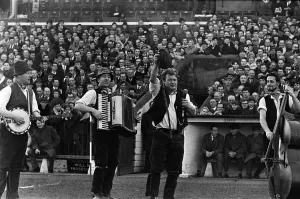 Adge Cutler and The Wurzels perform before the fans at the Bristol City ground