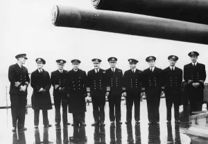 Admiral Sir Bruce Fraser on the quarterdeck of HMS Duke of York with the commanding