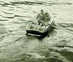 00190 Prints: Admiral Somerville takes a ride in a row boat as a form of early morning exercise before