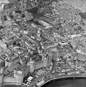 Gwynedd Prints: An aerial view of Caernarfon Castle the day before the Investiture of Prince Charles