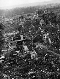 Bombed Prints: Aerial view of Julich showing the heavy damage inflicted upon the town