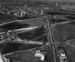 Motorways Prints: Aerial view of M57 Motorway, The East Lancashire Road is seen (right