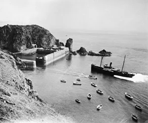 Channel Islands Prints: An aerial view showing Creux Harbour on the island of Sark in the Channel Islands