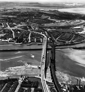 Towns Prints: Aerial view showing the new Runcorn - Widnes bridge across the River Mersey