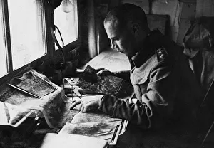 Air Army photographic interpretation unit with 8th army. (Picture) Captain A