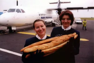 Flying Prints: Air France stewardesses Karen Brown (left) and Sarah Asch prepare for the inaugural