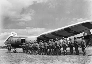 Airborne soldiers board a Airspeed Horsa gliders in preparation for moving off to their
