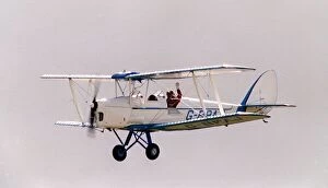 00132 Collection: Aircraft de Havilland DH82 Tiger Moth August 1993 flying at the Wroughton