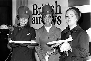 Flying Prints: Airline stewardesses use model aircraft to show off the new red