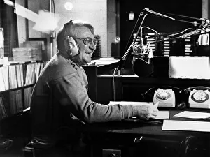 00253 Prints: On the air'Tommy Docherty jokes with a listener as he hosts a chat show
