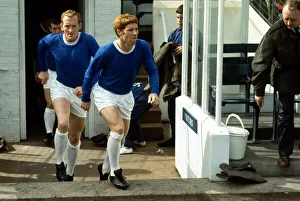 Alan Ball of Everton enters the pitch followed by teammate Sandy Brown before a match