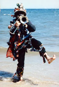 Instrument Prints: Alan Laing of Flag Crackers Folk Group gets into the splash of things during Redcar Folk