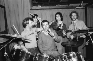 Drumming Prints: Alan Minter with pop group Jigsaw at recording studio in Clapham