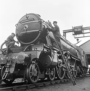 Rail Prints: Alan Pegler, (right on his ladder), cleans and polishes The Flying Scotsman