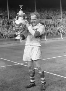 Alan Prescott the St Helens captain seen here celebrating after his teams 13 - 2 victory