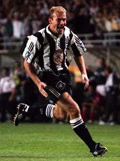 ALAN SHEARER CELEBARTES AFTER SCORING FOR NEWCASTLE V WIMBLDON -1996