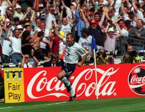 Alan Shearer of England celebrates after scoring against Scotland during the European