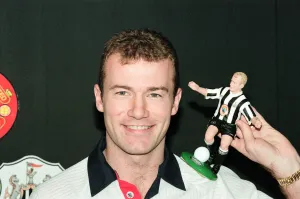 Toys Prints: Alan Shearer holding his soccer figure from the Soccer Superheroes collection
