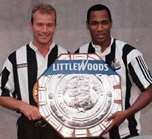 Alan Shearer and Les Ferdinand of Newcastle holding the charity Shield before Sundays