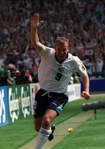 Alan Shearer scores the opening goal during the England v Scotland game of the European