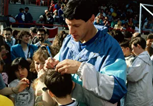 Jon Scan Prints: Alan Wells signing autograph on childs head November 1988