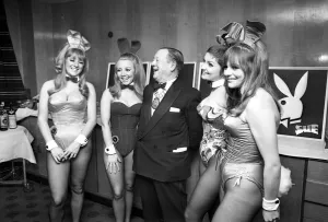 Alderman Harry Weston in attractive company during the annual charity ball of