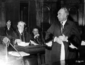 Unhappy Prints: Alderman T J Kerrigan, about to remove the aldermanic robe he was wearing
