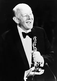 Dinner Jacket Prints: Alec Guinness actor collects speacial award at Oscars in May 1980