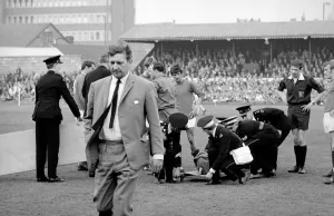 Worried Prints: Alec Stock Manager of QPR - April 1968 Walking away from injured player Morgan