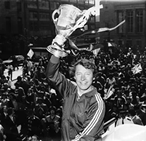 Alex Ferguson holding the Scottish league championship trophy after winning the Scottish