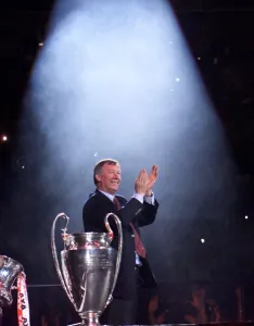 1998 99 Prints: Alex Ferguson in the spotlight receiving May 1999 the cheers of the Manchester