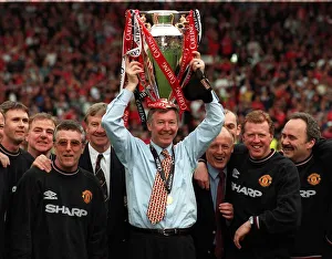 Alex Fergusonwith the Premiership trophy May 1999 on his headafter his Manchester