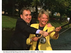 Fishing Rod Prints: Alex Salmond and Margaret Ewing in yellow jacket September 1994