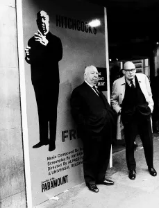 00054 Prints: Alfred Hitchcock film director outside the Plaza Cinema in Londons Lower Regent Street