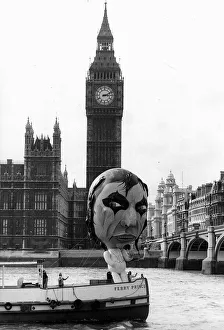 Alice Cooper American rock singer with balloon sailing past Big Ben