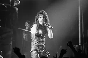Show Prints: Alice Cooper (born Vincent Damon Furnier) brandishing his cutless sword