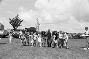 All fall down! Contestants in the three-legged race at Scissett C of E First School
